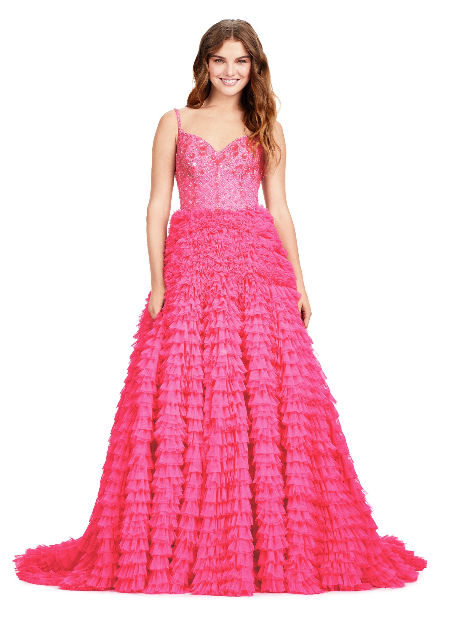 Elegant pink ball gown featuring a fitted bodice with delicate lace details and a full-tiered ruffle skirt extending into a dramatic train.