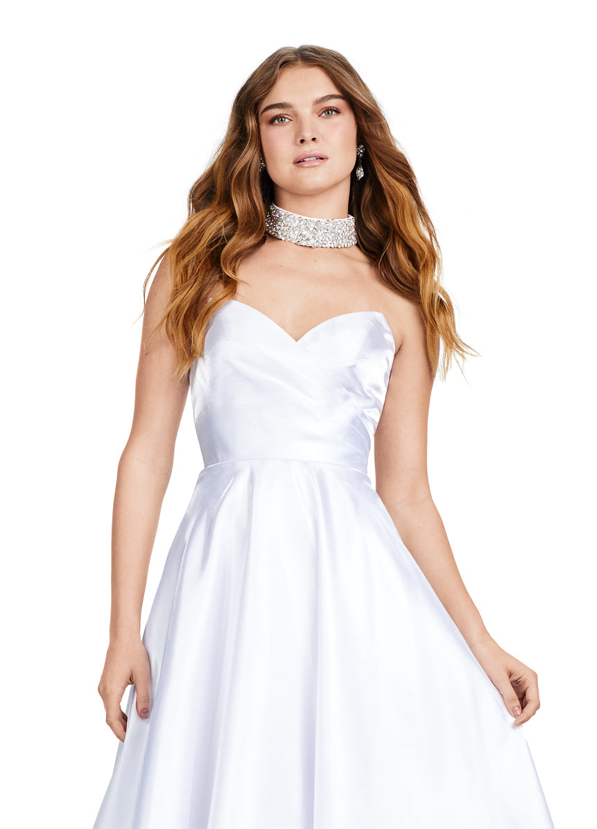 Elegant white strapless ball gown with sweetheart neckline, perfect for formal occasions or weddings.