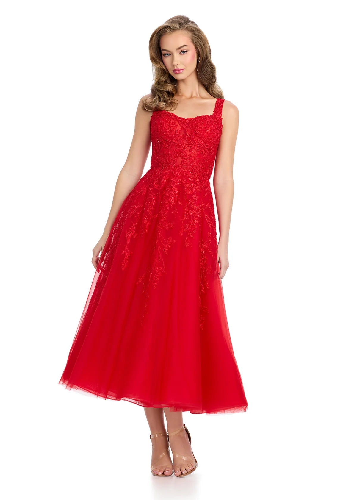 Red midi dress featuring a sheer lace bodice with intricate beadwork, wide straps, and a voluminous A-line skirt, combining sophistication with modern elegance.