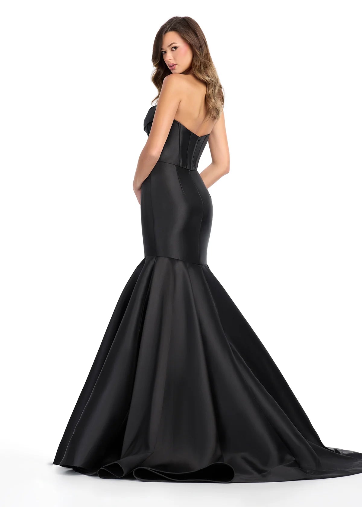 Strapless Black Mermaid Gown Featuring A Satin Corset Bodice And Dramatic Flared Skirt. Back View.