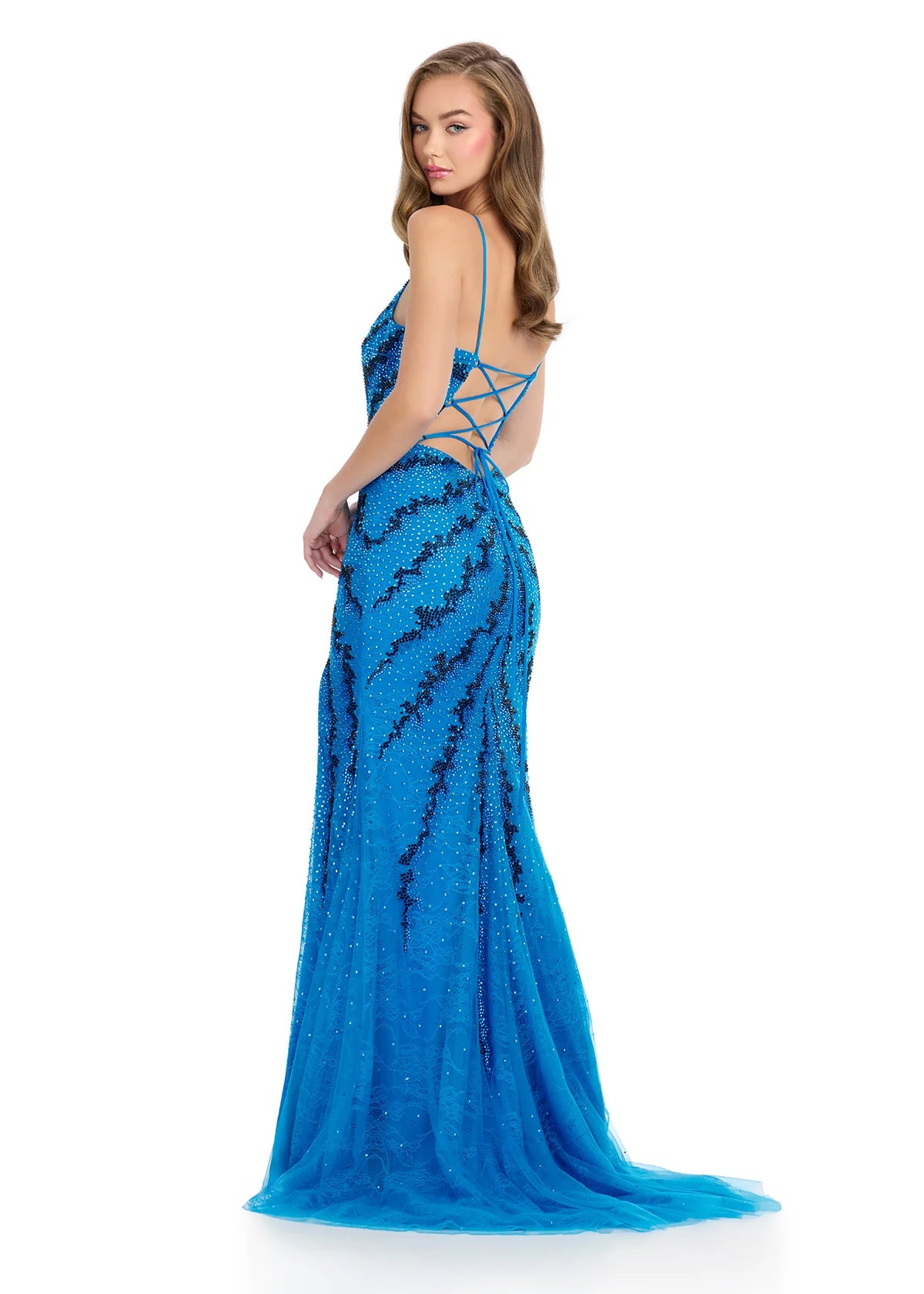 Back view - Blue floor-length evening gown with a plunging neckline, silver beaded swirl detailing, thin spaghetti straps, and a thigh-high slit for an elegant and striking look.