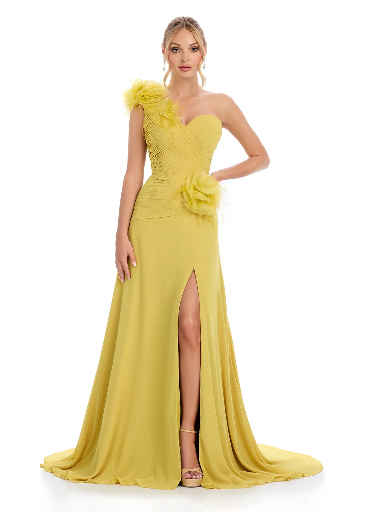 Elegant mustard one-shoulder gown with feather and floral embellishments, featuring a ruched bodice, thigh-high slit, and flowing train for a dramatic and sophisticated look.