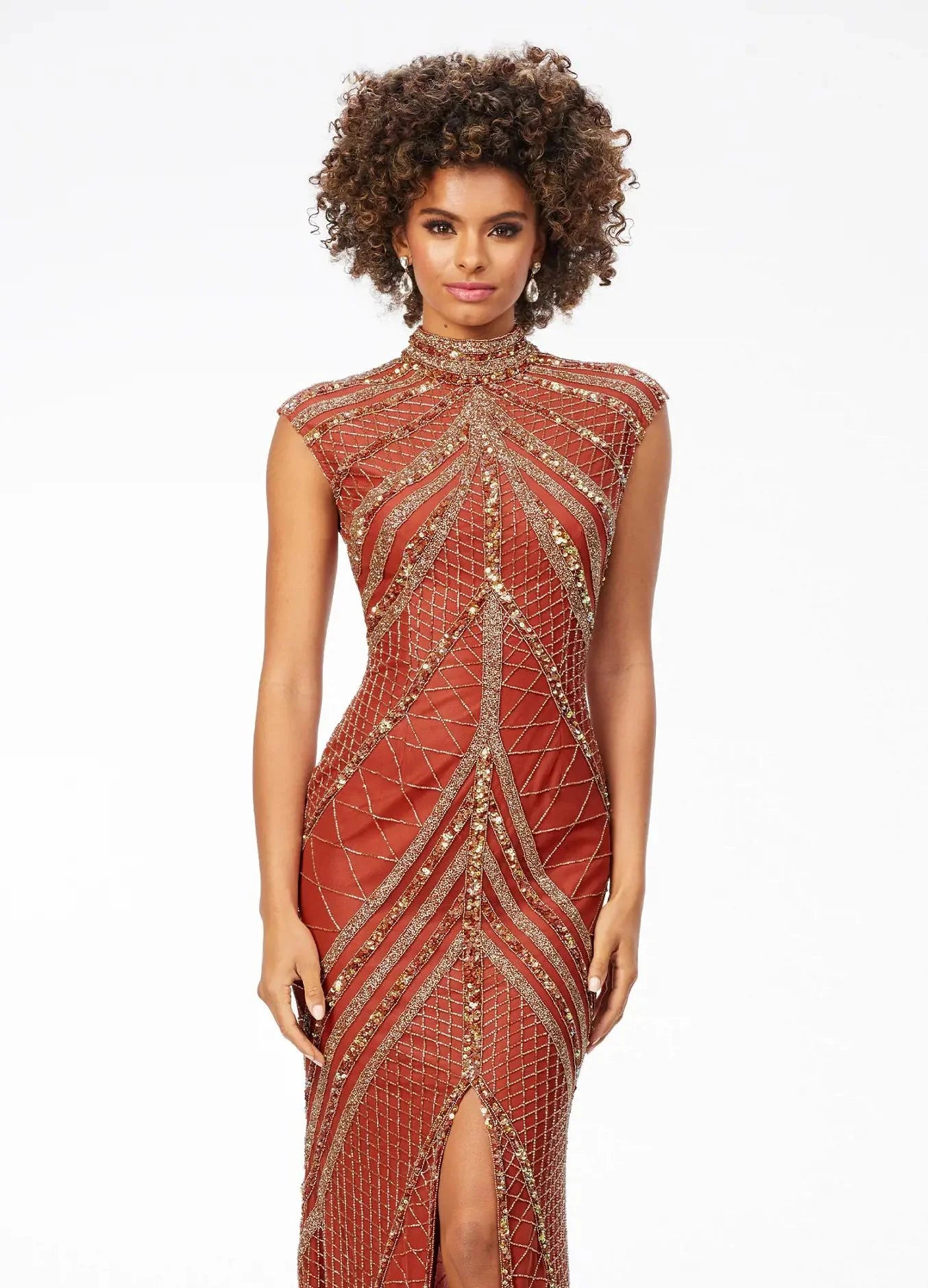 Geometric gown with intricate beadwork, a high neckline, and cap sleeves, designed with a dramatic front slit for a striking and elegant look.