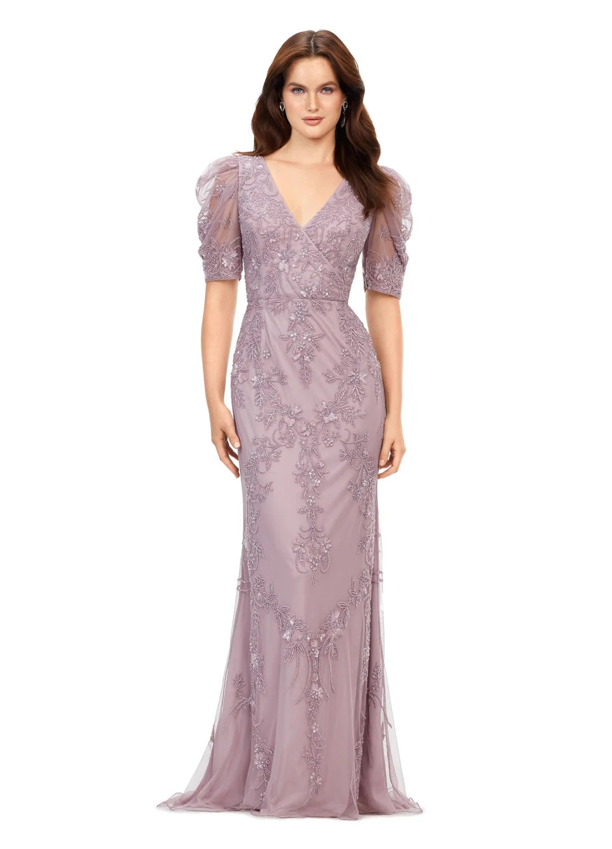 This elegant evening gown features a delicate floral lace design with subtle embroidery, puff sleeves, and a flattering V-neckline. The form-fitting silhouette flows into a soft train, exuding timeless sophistication.