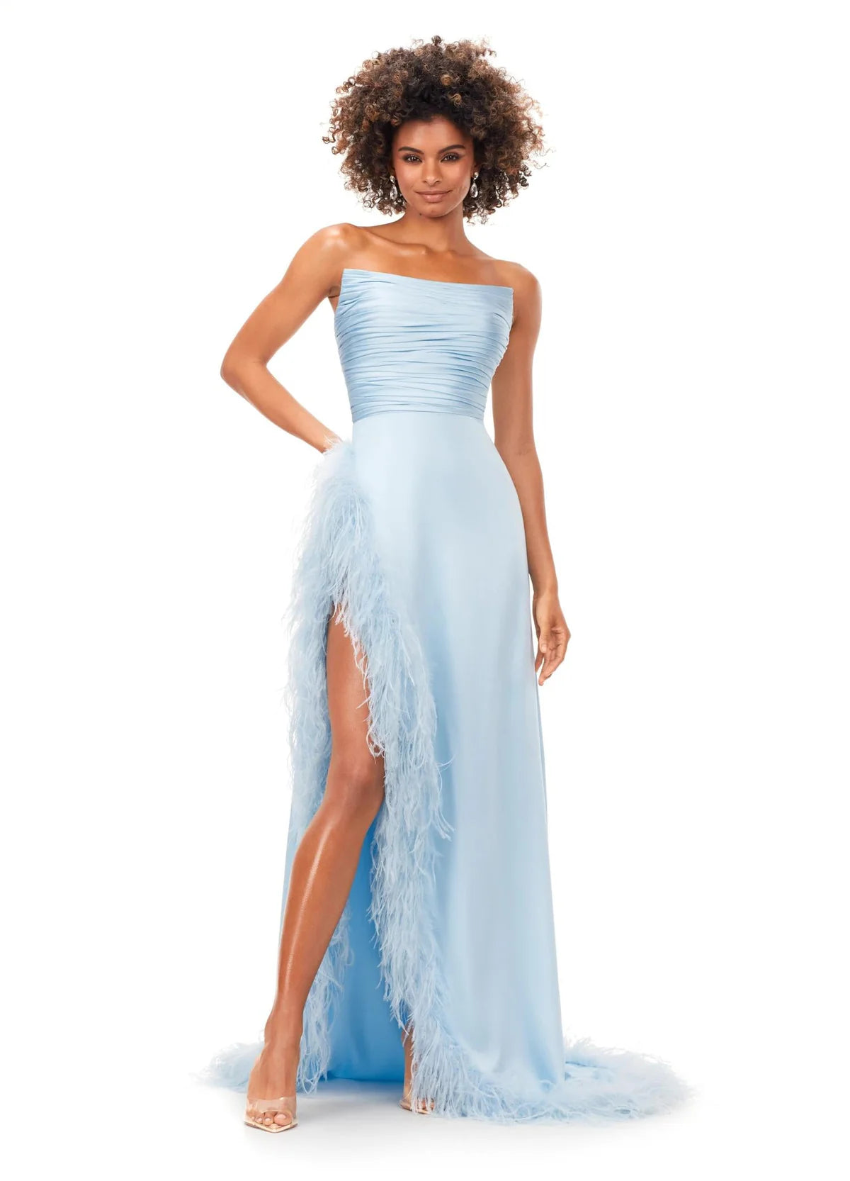 Elegant light blue strapless evening gown featuring a ruched bodice and a dramatic feather-trimmed slit, exuding timeless sophistication and modern flair.