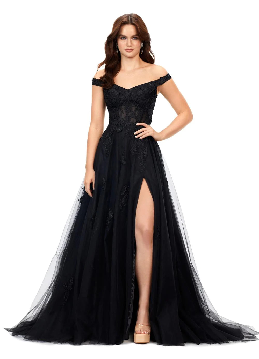 Off-The-Shoulder Black Ball Gown Featuring Lace Detailing, Sheer Bodice, Flowing Tulle Skirt, And High Side Slit.