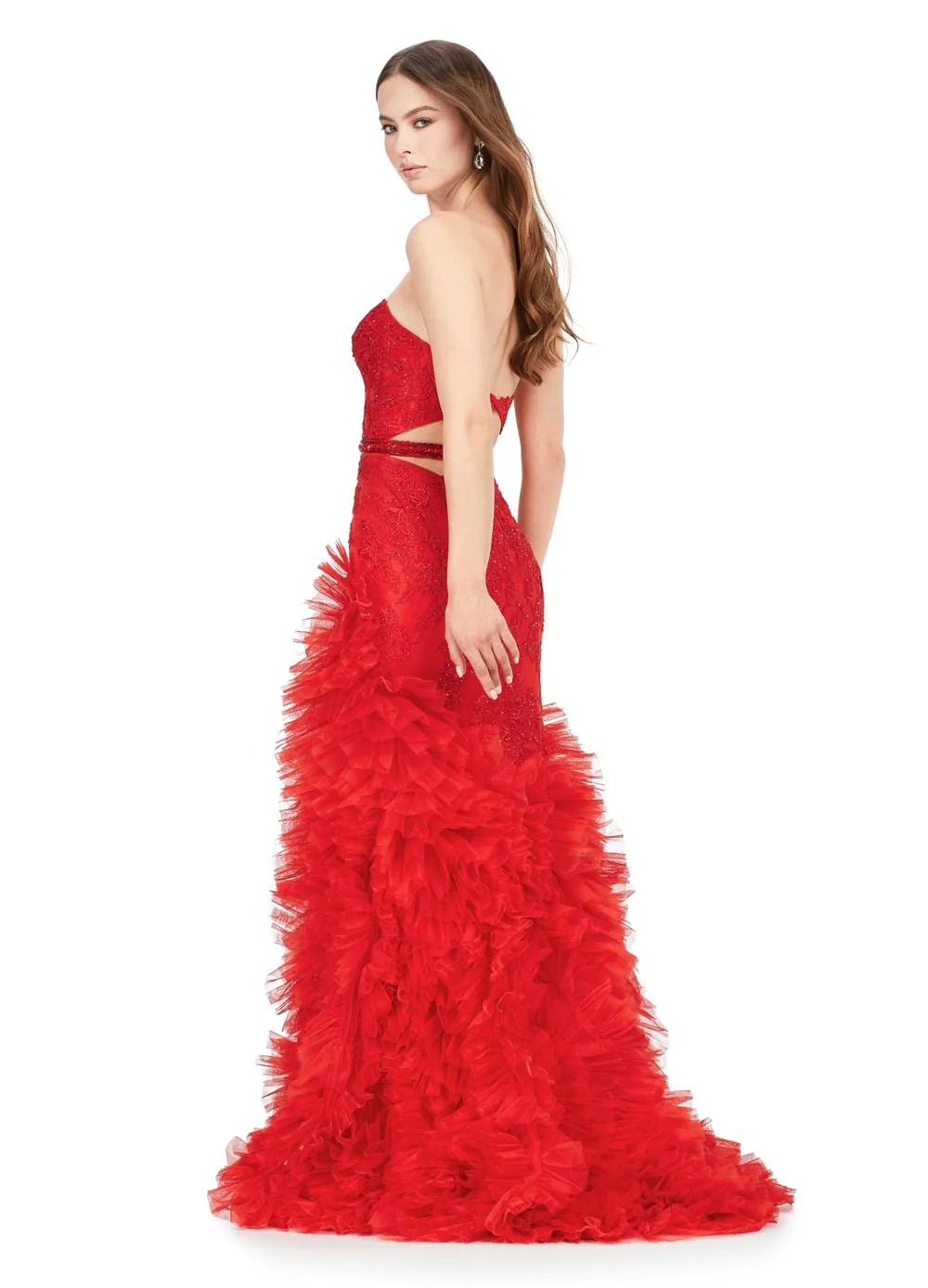 Back View - Strapless red gown with a plunging neckline, lace detailing, high slit, and a voluminous ruffled skirt cascading to a floor-length design.