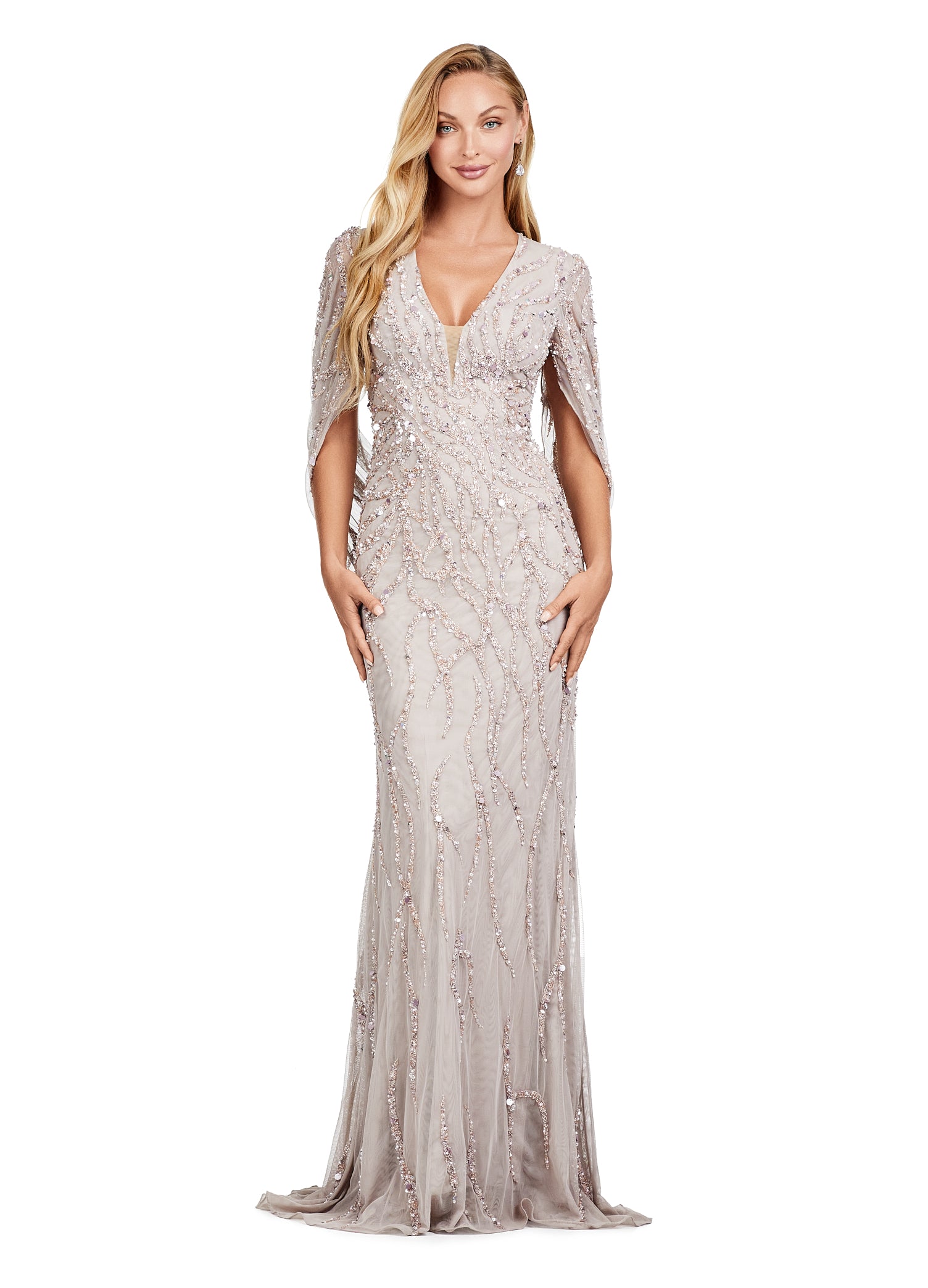 Graceful floor-length silver gown with a deep V-neckline and flowing cape sleeves, adorned with intricate beadwork and shimmering embellishments, perfect for an elegant evening affair.