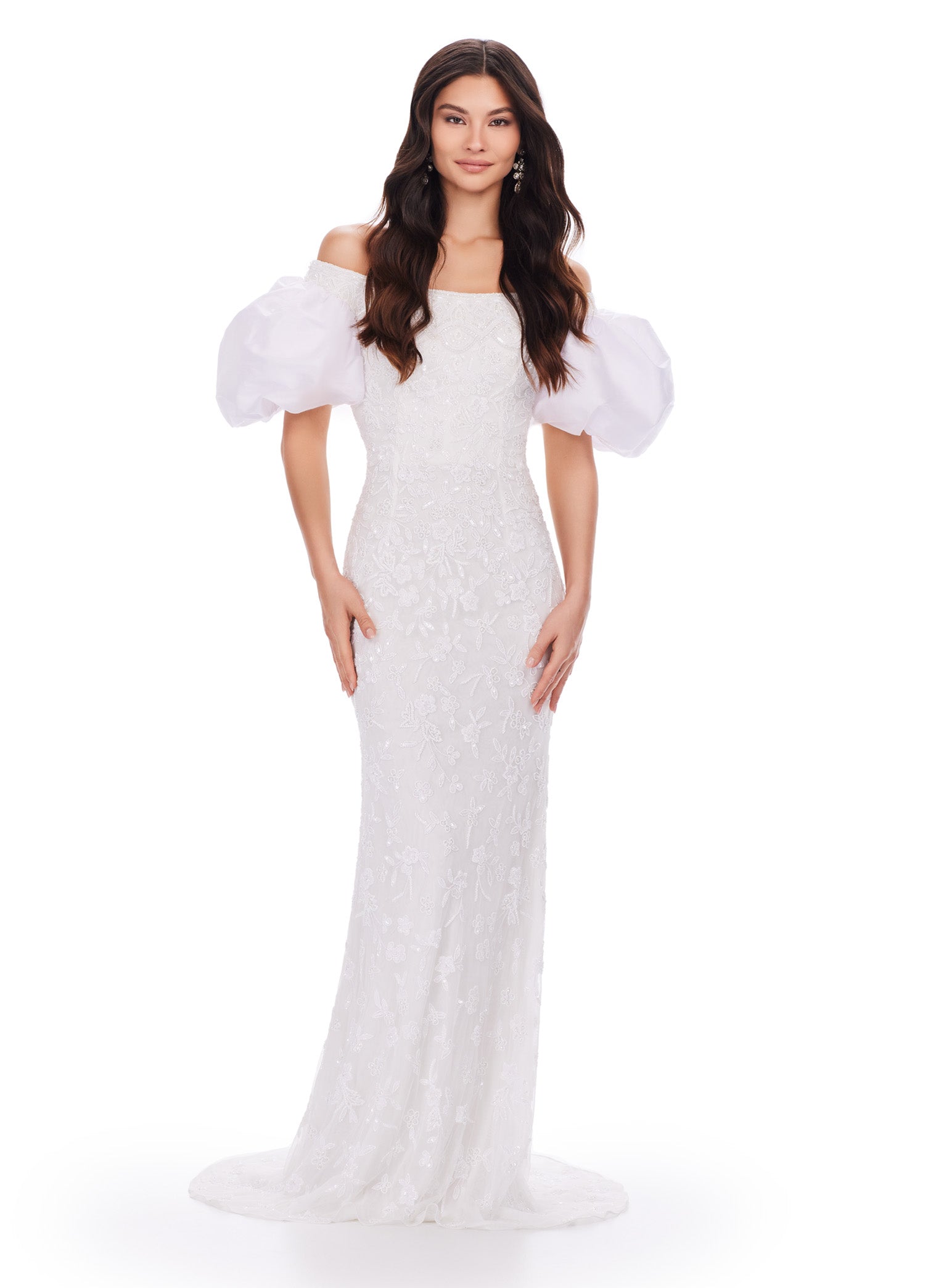 Elegant off-the-shoulder white evening gown with dramatic puff sleeves and delicate green floral embellishments, creating a sophisticated and timeless look.