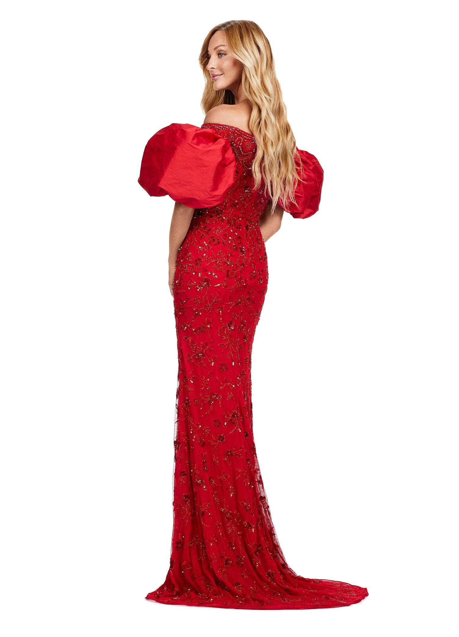 Elegant off-the-shoulder red evening gown with dramatic puff sleeves and delicate green floral embellishments, creating a sophisticated and timeless look.