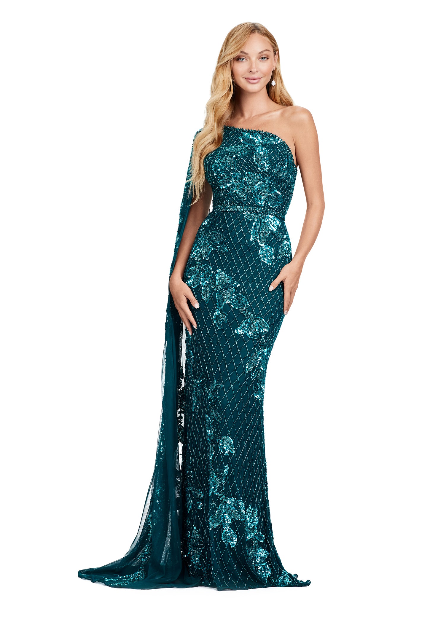 One-shoulder teal gown adorned with intricate floral sequin embroidery, a fitted silhouette, a dramatic floor-length cape detail, and a patterned design.