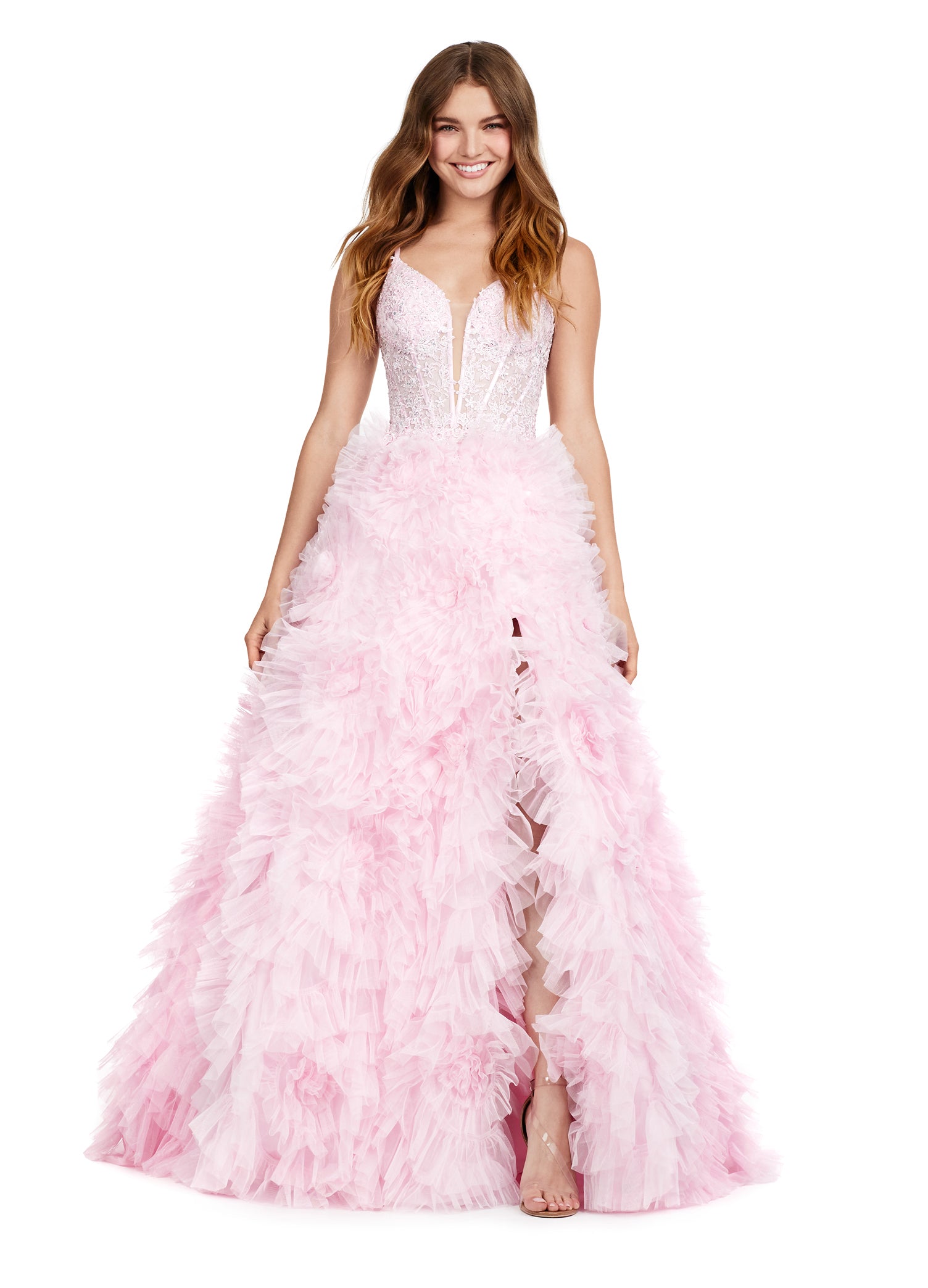 Elegant pink evening gown with a plunging neckline, lace bodice, and a dramatic tiered ruffle skirt with a high slit.