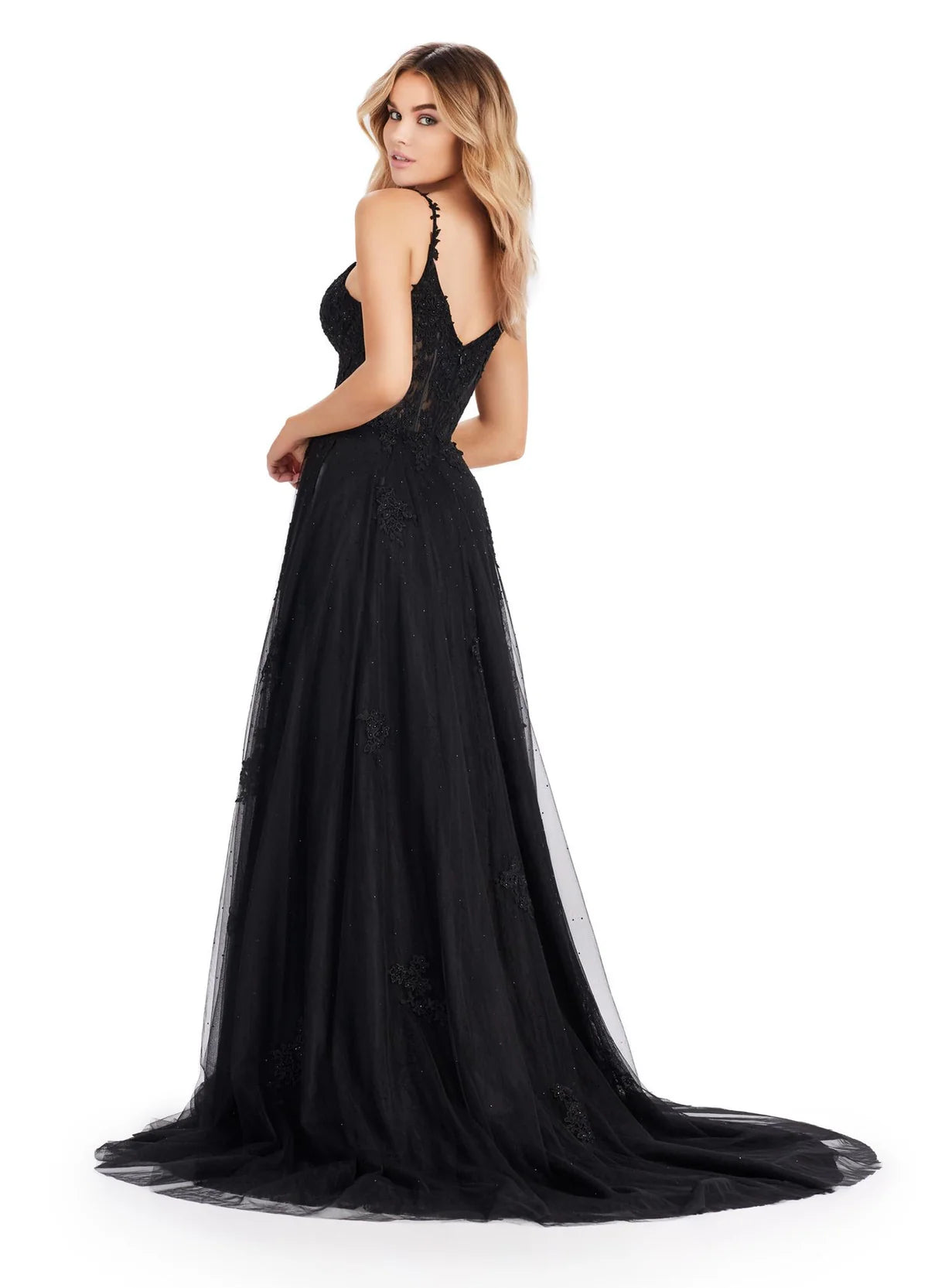 Back View - Black tulle ball gown featuring a sweetheart neckline, sheer bodice with lace appliqués, thigh-high slit, and a flowing layered skirt.