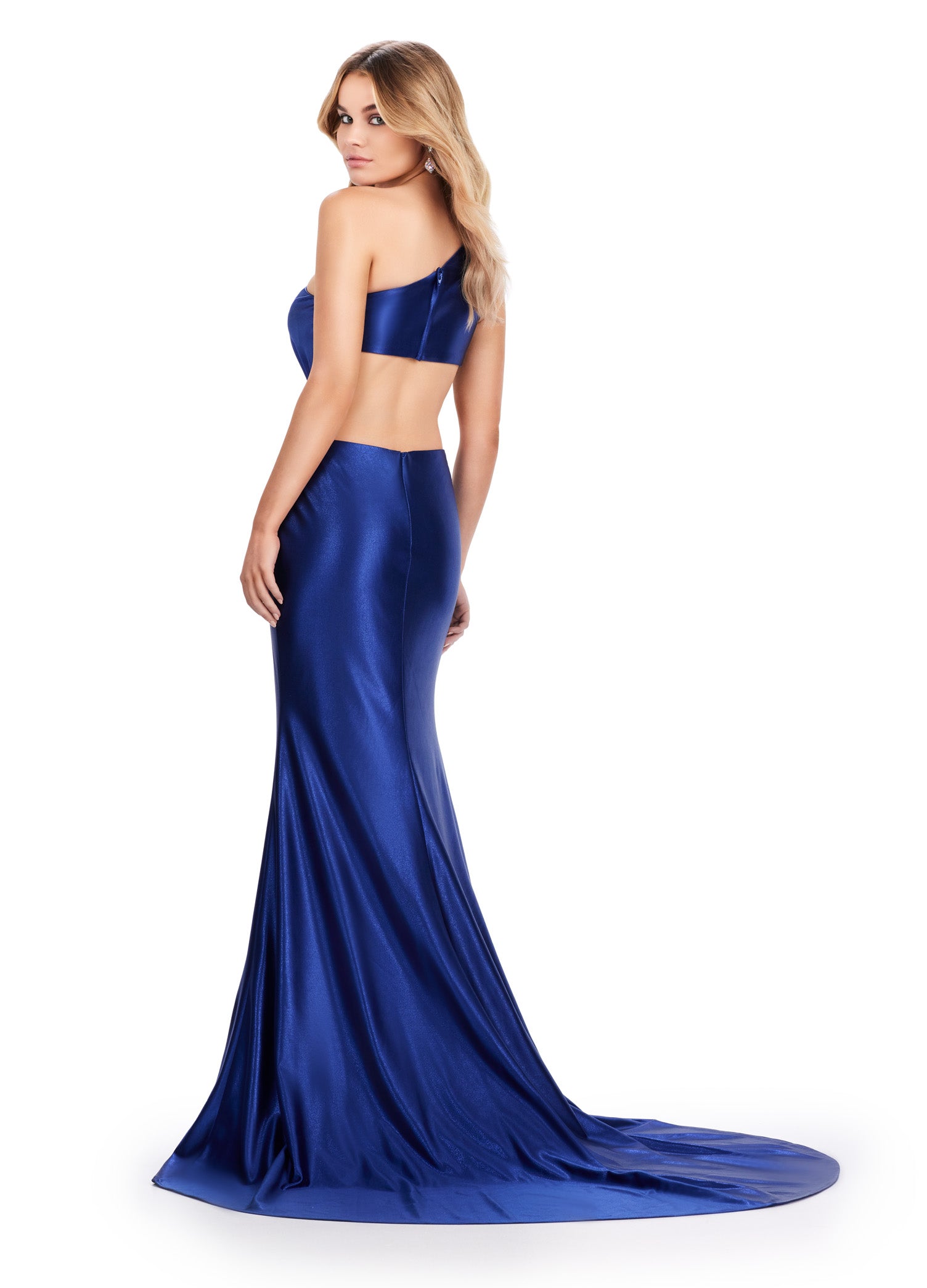 Satin royal blue gown featuring an asymmetrical neckline, a cut-out waist design accented with a sparkling embellishment, and a floor-length silhouette for a sophisticated evening look. Back View