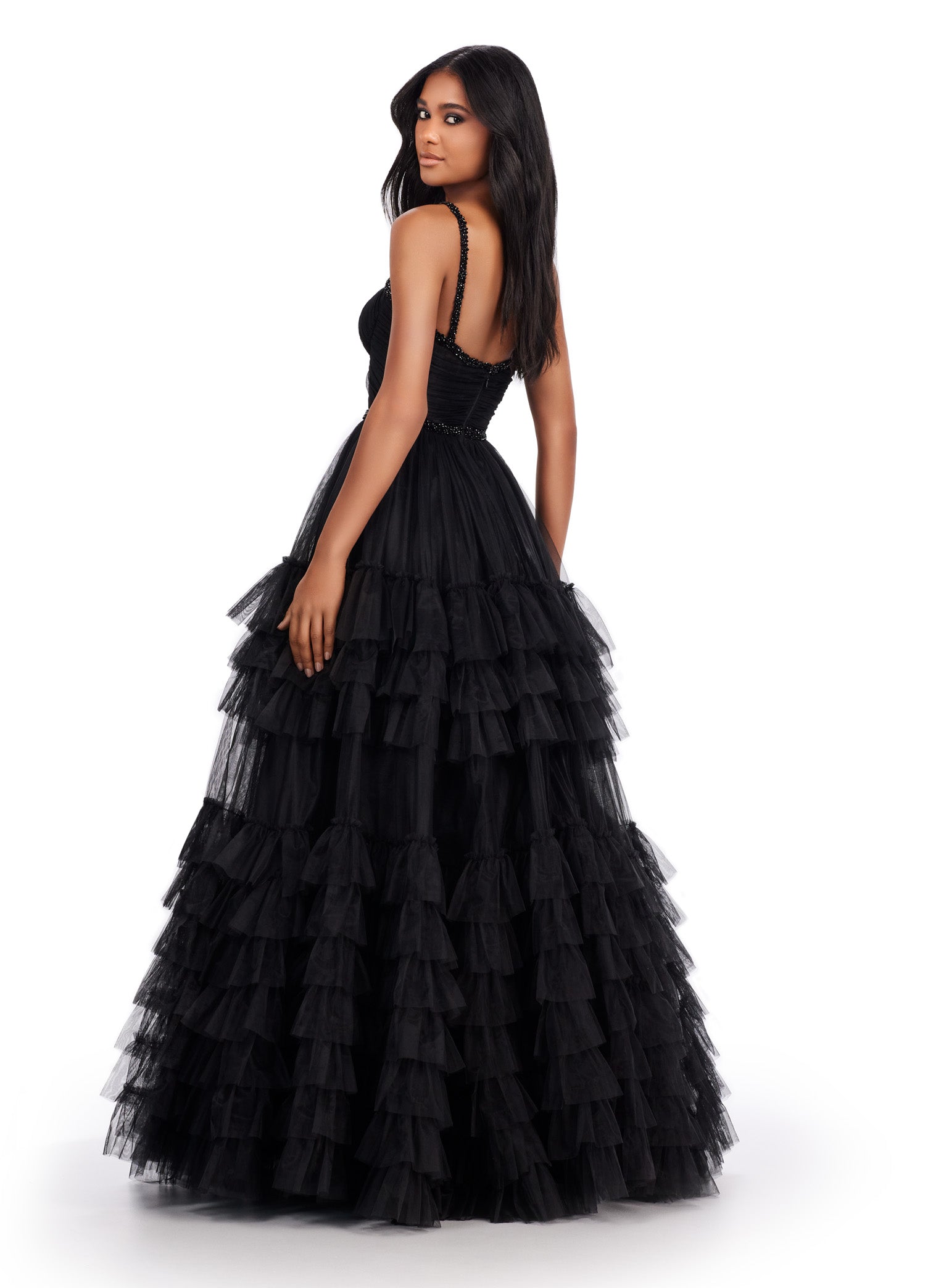 Back view - Black ball gown with a sweetheart neckline, fitted bodice, embellished waistband, and tiered tulle skirt.