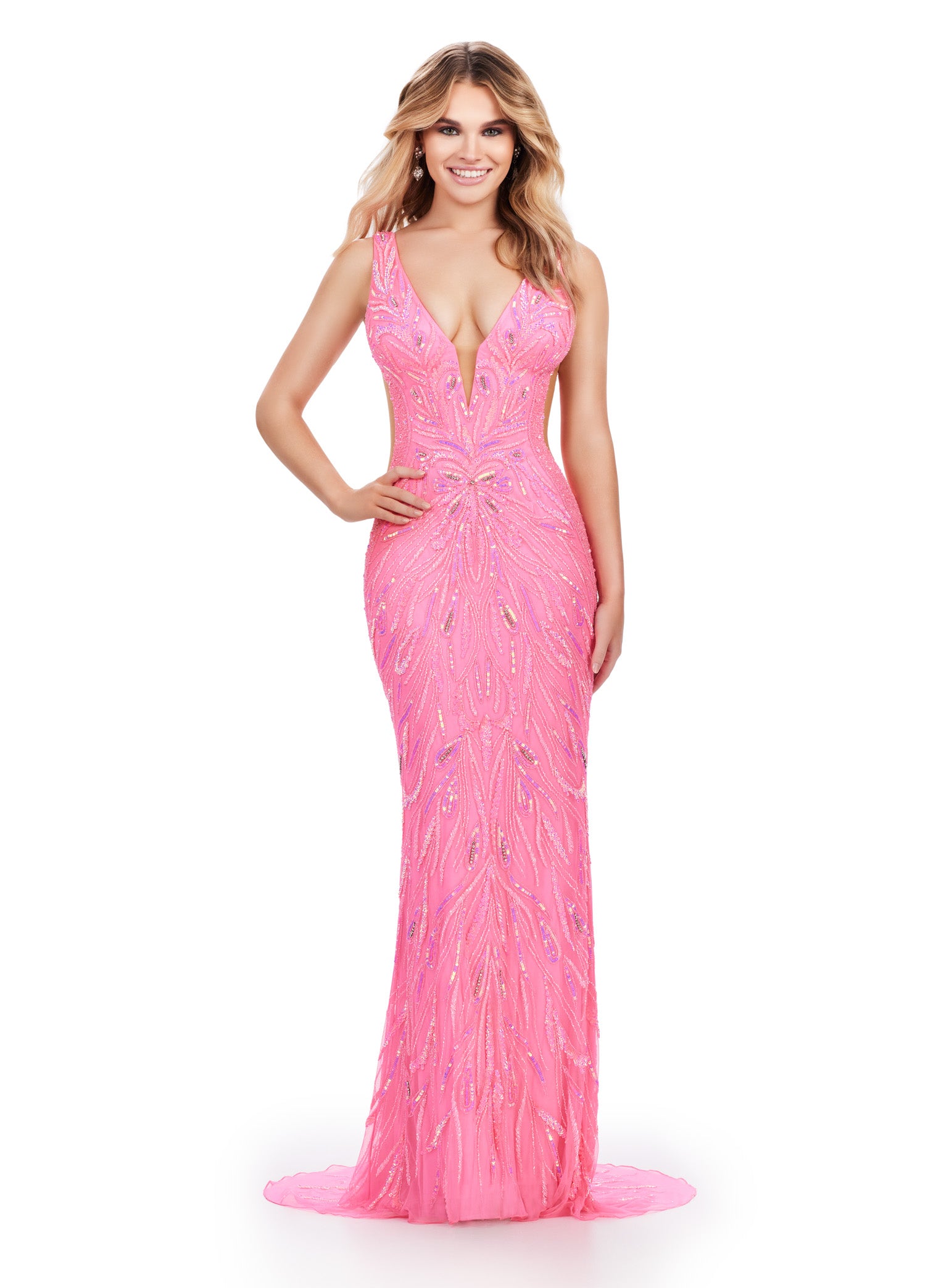 Pink Embellished Gown With A Plunging V-Neckline, Sheer Side Panels, And Intricate Beaded Design.