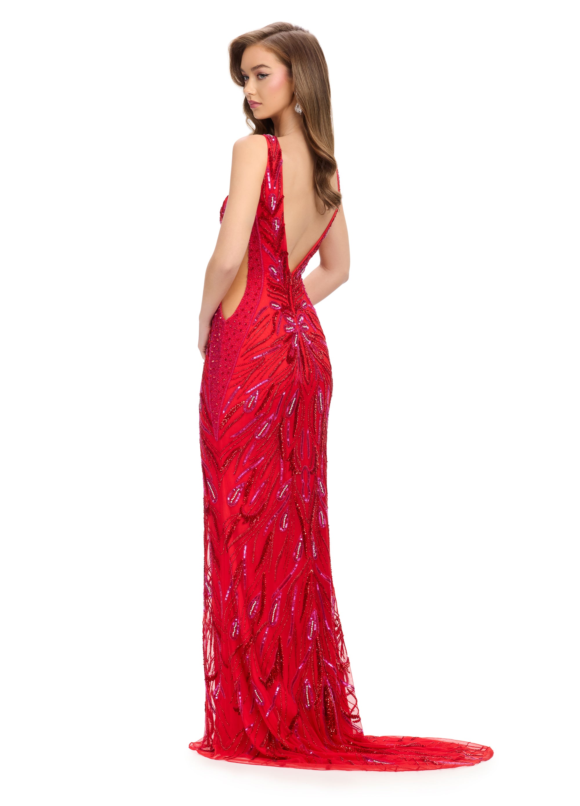 Red Embellished Gown With A Plunging V-Neckline, Sheer Side Panels, And Intricate Beaded Design. Back View.