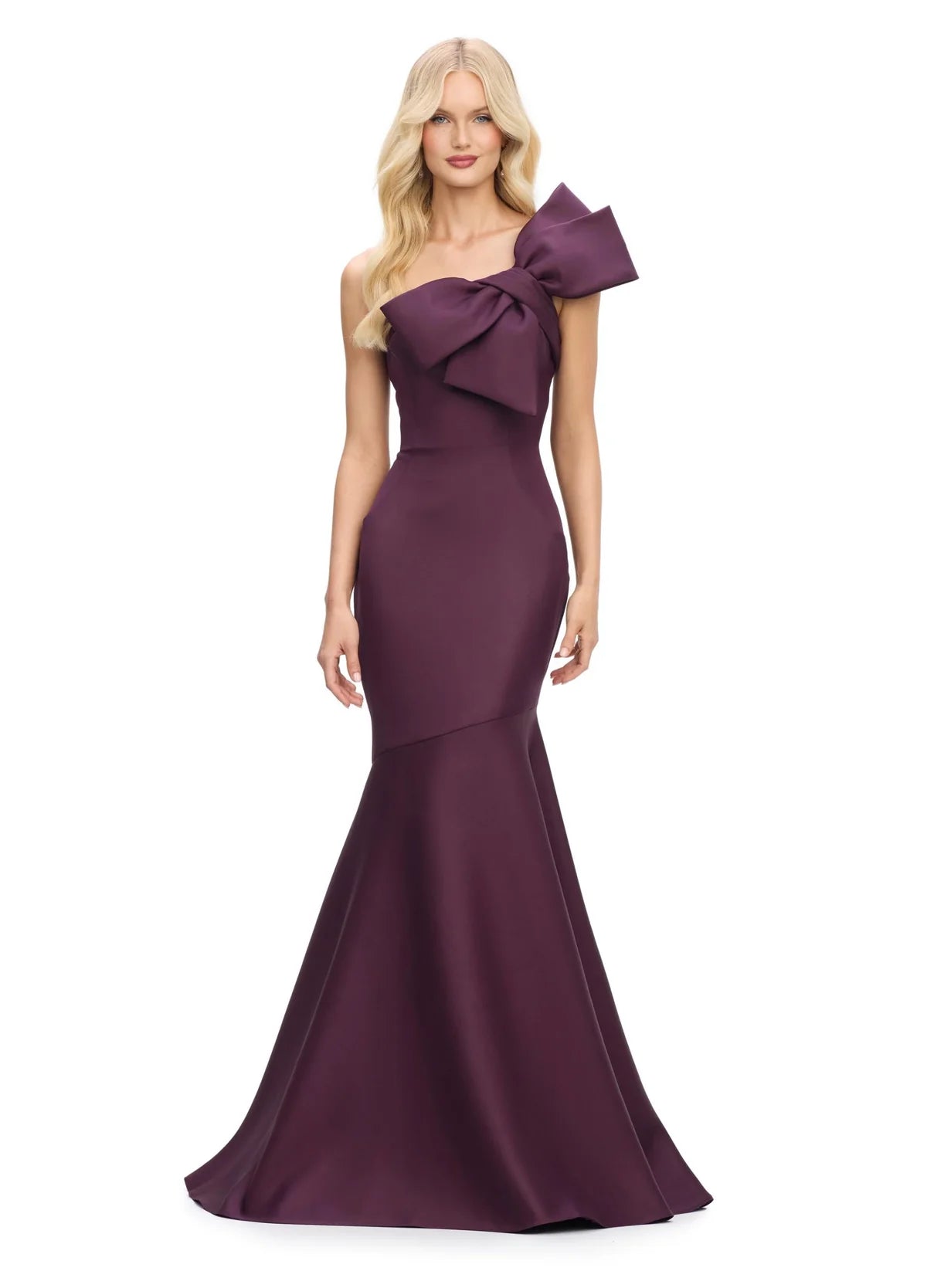 Deep purple elegant mermaid gown featuring a dramatic oversized bow at the shoulder, creating a stunning blend of modern sophistication and timeless charm.