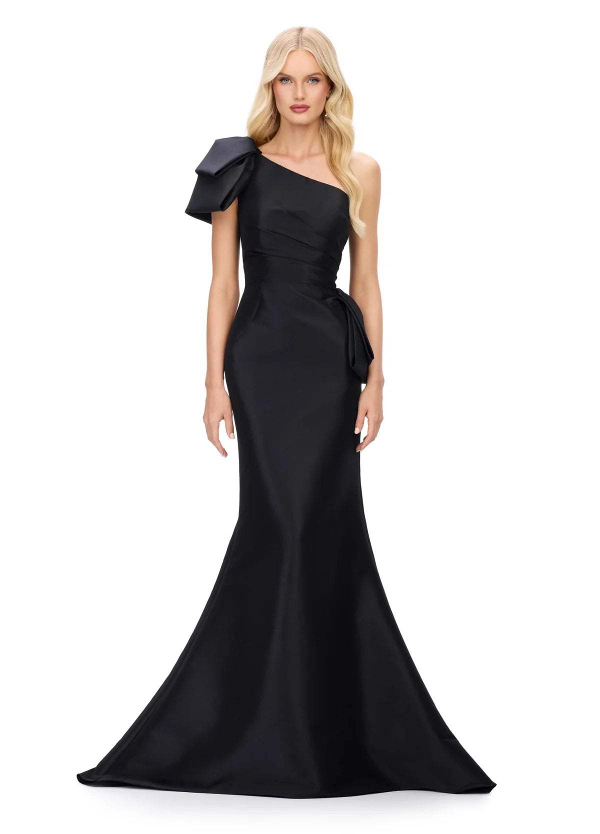 Black elegant one-shoulder evening gown with a statement bow accent, fitted silhouette, and flared mermaid hemline for a sophisticated and timeless look.