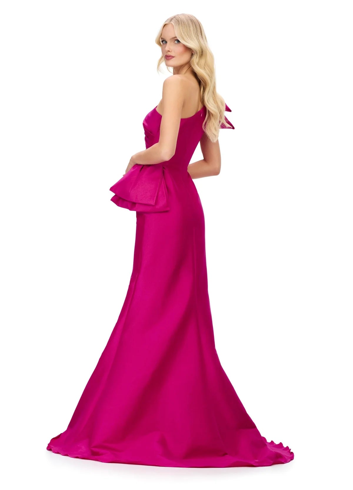 Back view - Pink elegant one-shoulder evening gown with a statement bow accent, fitted silhouette, and flared mermaid hemline for a sophisticated and timeless look.