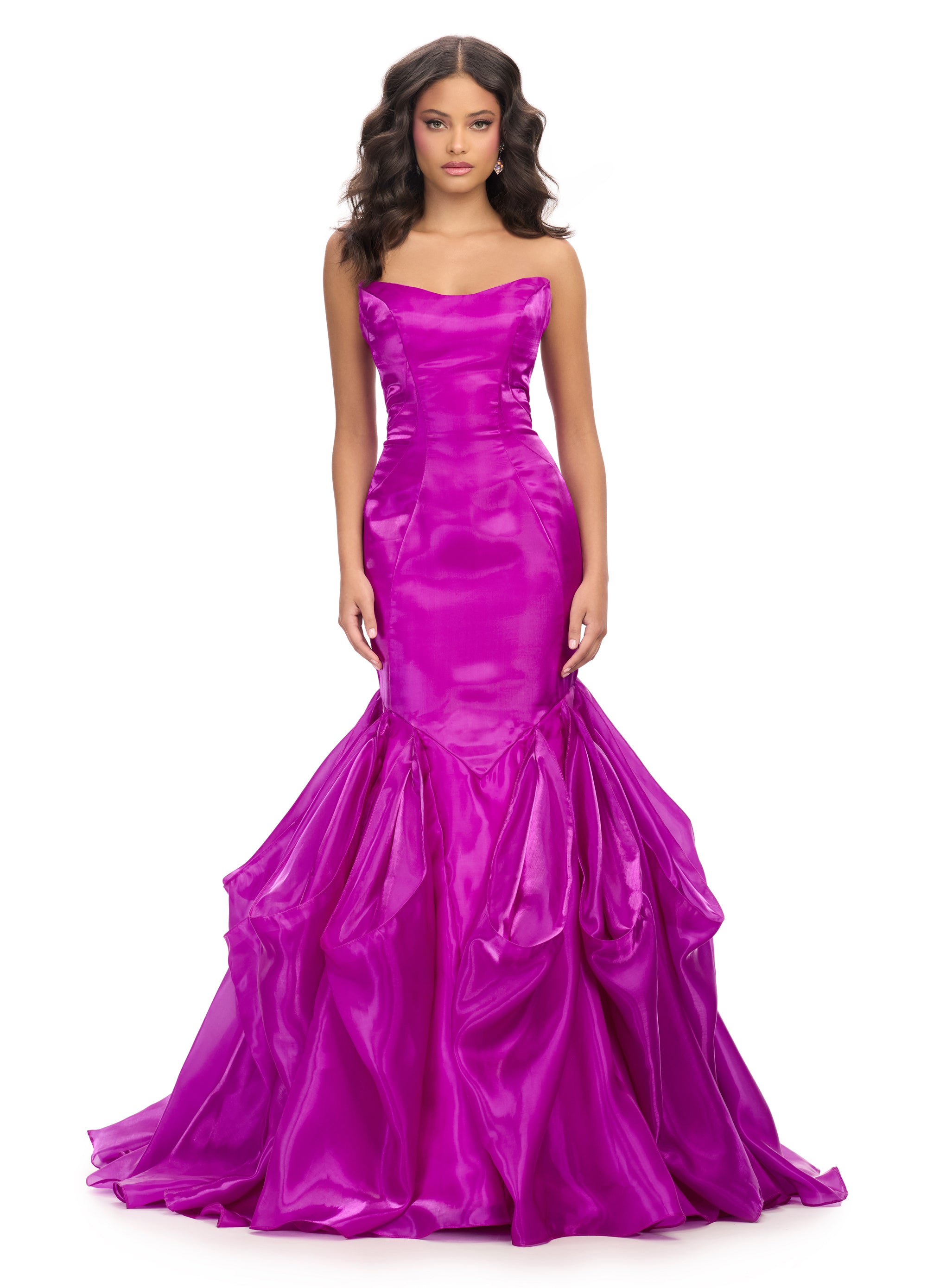 Strapless mermaid gown crafted from luxurious satin, featuring a structured bodice and dramatic ruched skirt for an elegant and timeless silhouette.