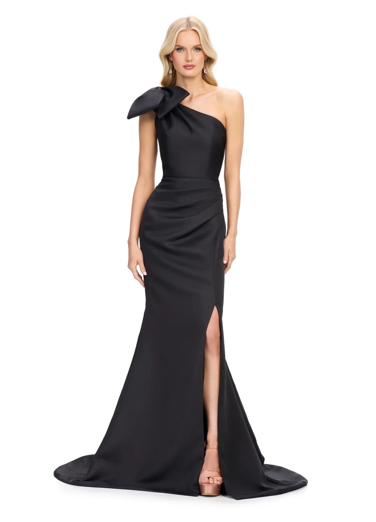 Elegant black one-shoulder gown with a dramatic oversized bow accent, a figure-flattering silhouette, and a thigh-high slit for a touch of sophistication.