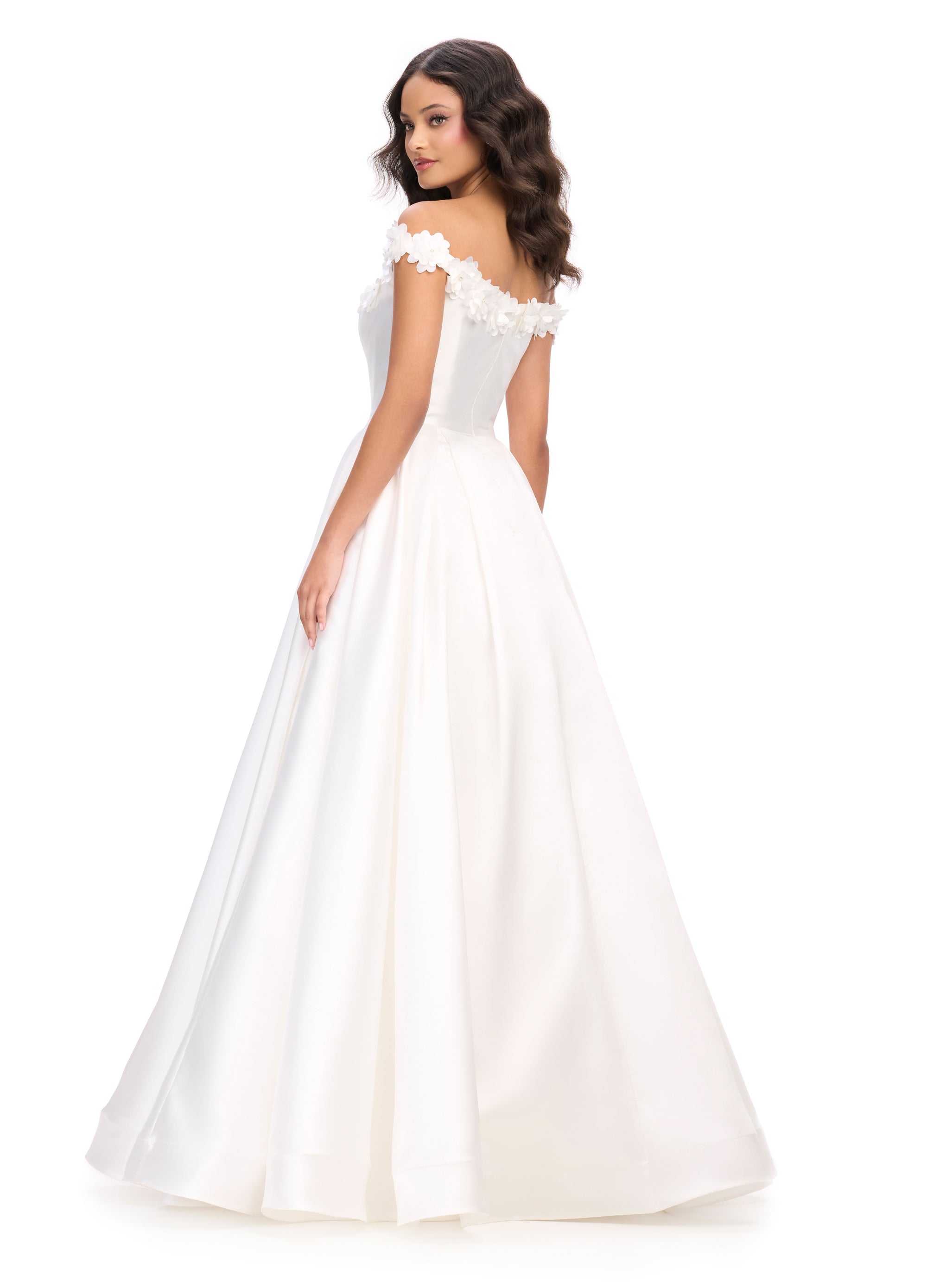 White ball gown featuring an off-the-shoulder neckline adorned with floral appliqués, creating a timeless and elegant bridal look. Back view.