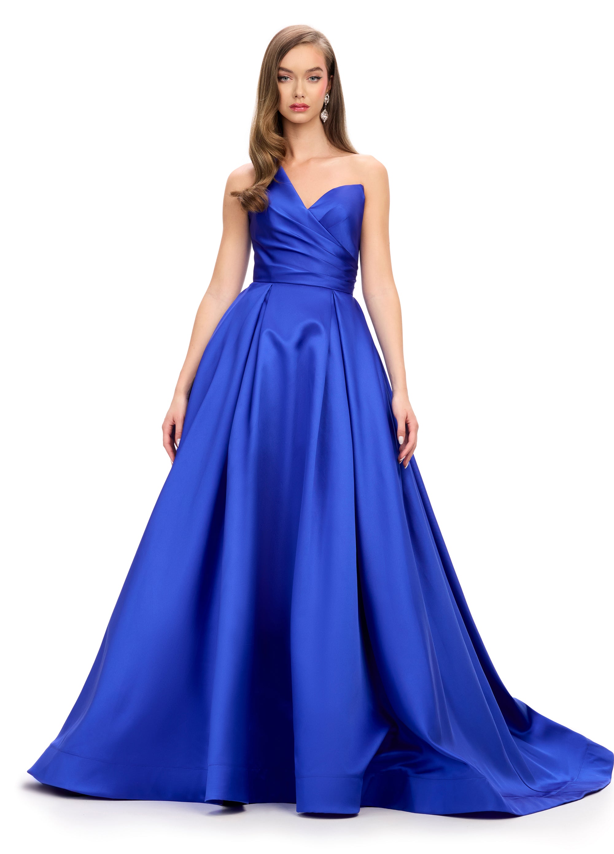 Striking royal blue ball gown with a plunging neckline, wrap-style bodice, and a dramatic full skirt, perfect for an unforgettable evening look.