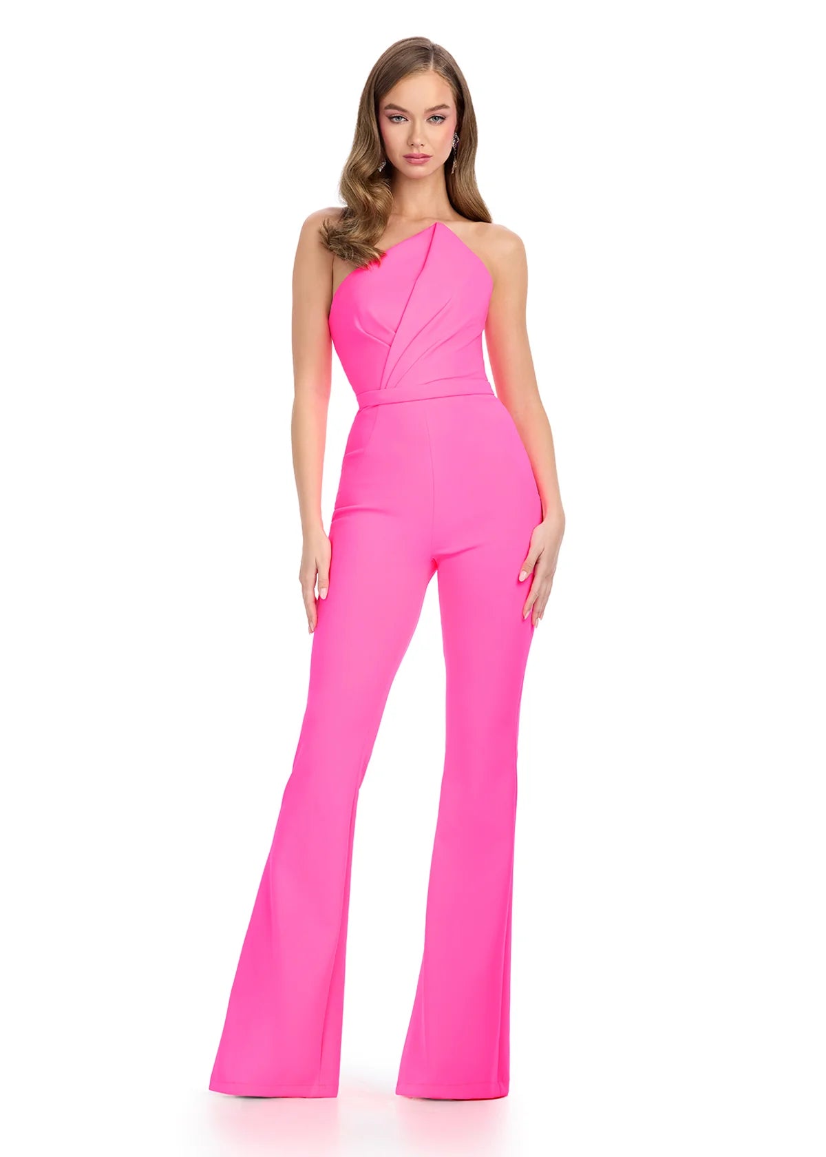 Fuchsia one-shoulder jumpsuit featuring a fitted bodice, cinched waist, and flared trousers for a chic and modern look.