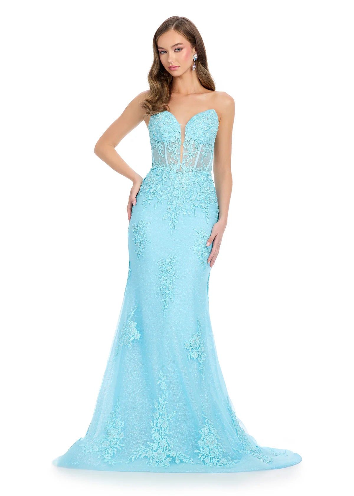 Strapless light blue gown with floral lace detailing, a sheer bodice, and a fitted silhouette extending into a slight train.