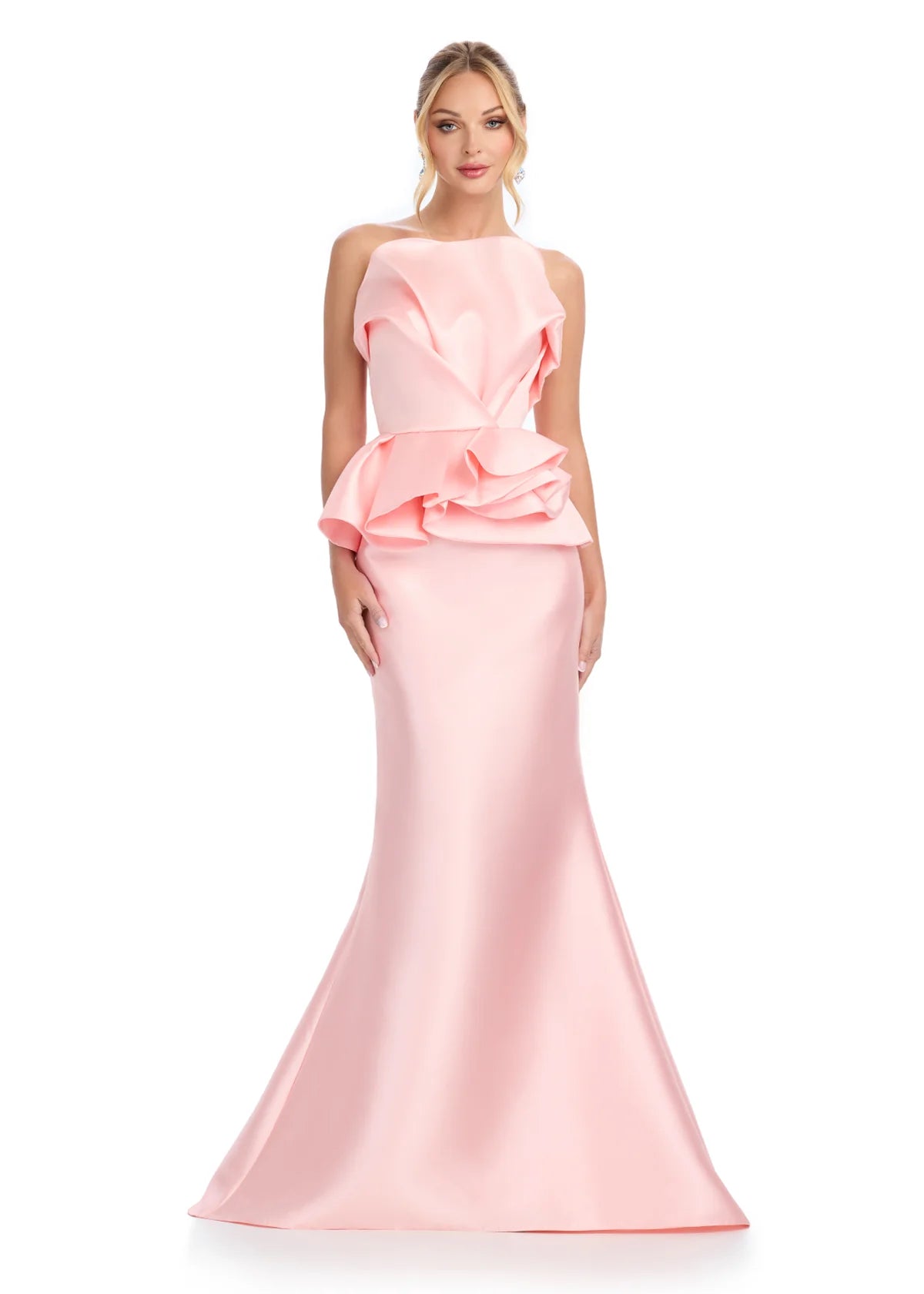 Blush pink mermaid gown featuring a strapless neckline with dramatic ruffle detailing, offering a chic and sophisticated look.