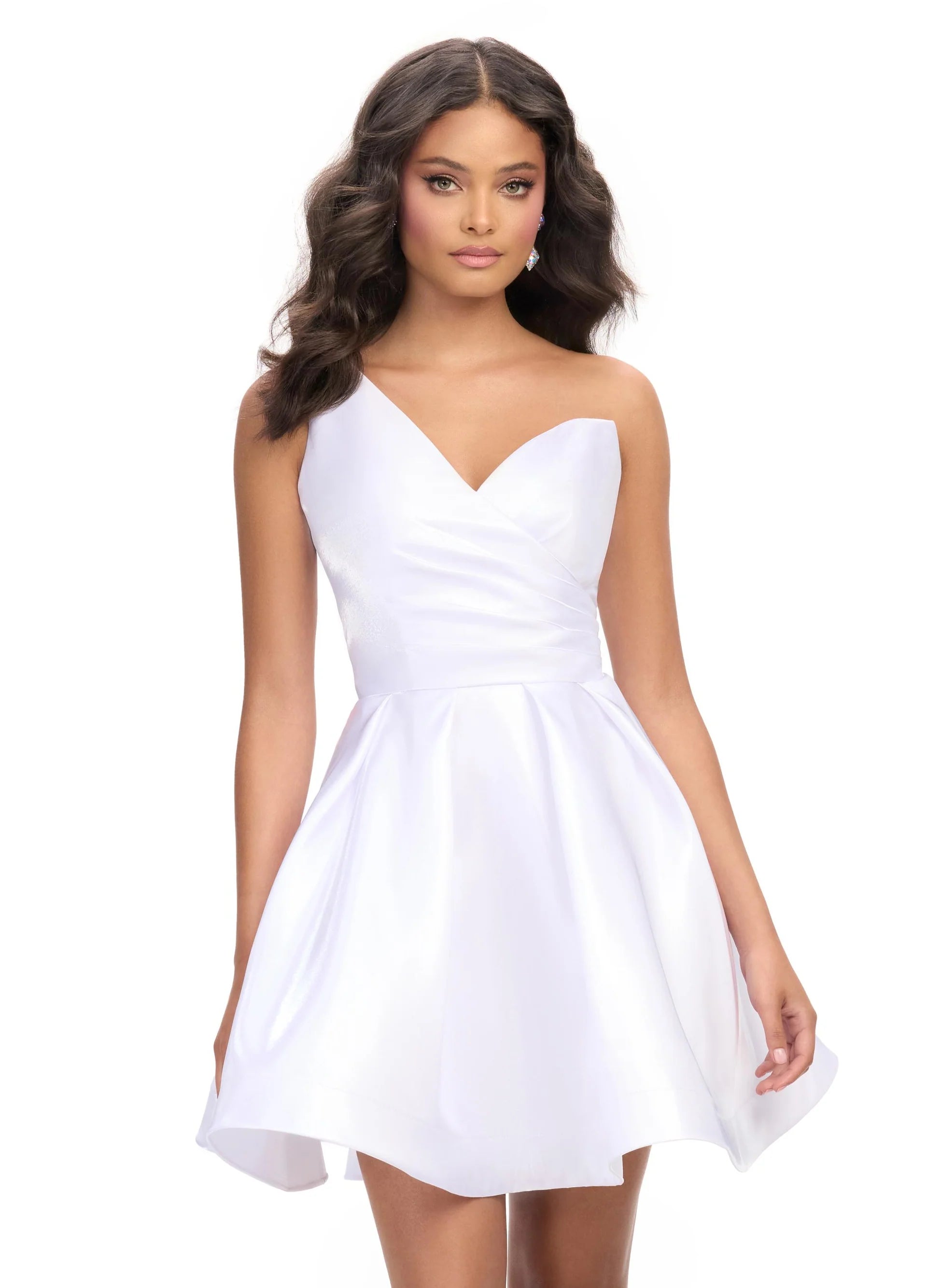 White satin mini dress featuring an asymmetrical neckline, a fitted bodice with subtle pleating, and a flared skirt for a chic and playful look.