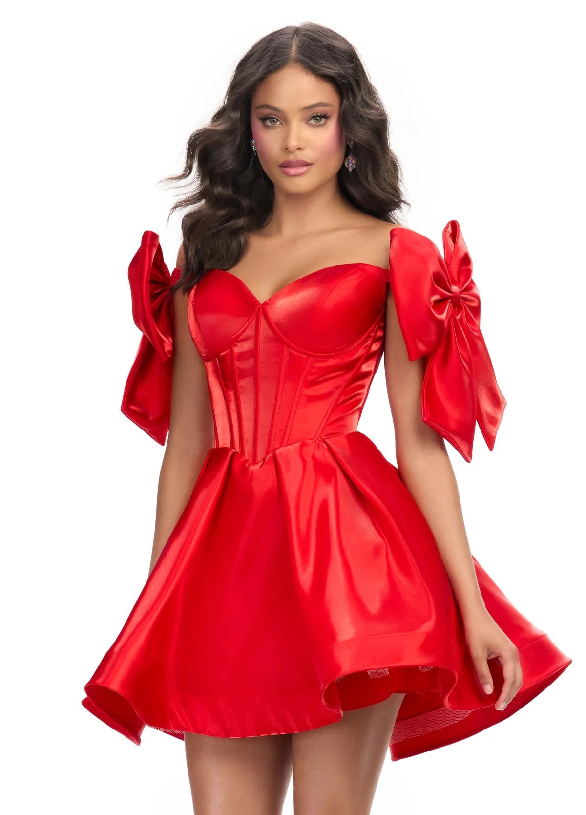 A striking red mini dress with a structured corset bodice, voluminous skirt, and oversized bow accents on the shoulders, perfect for a bold and playful statement look.