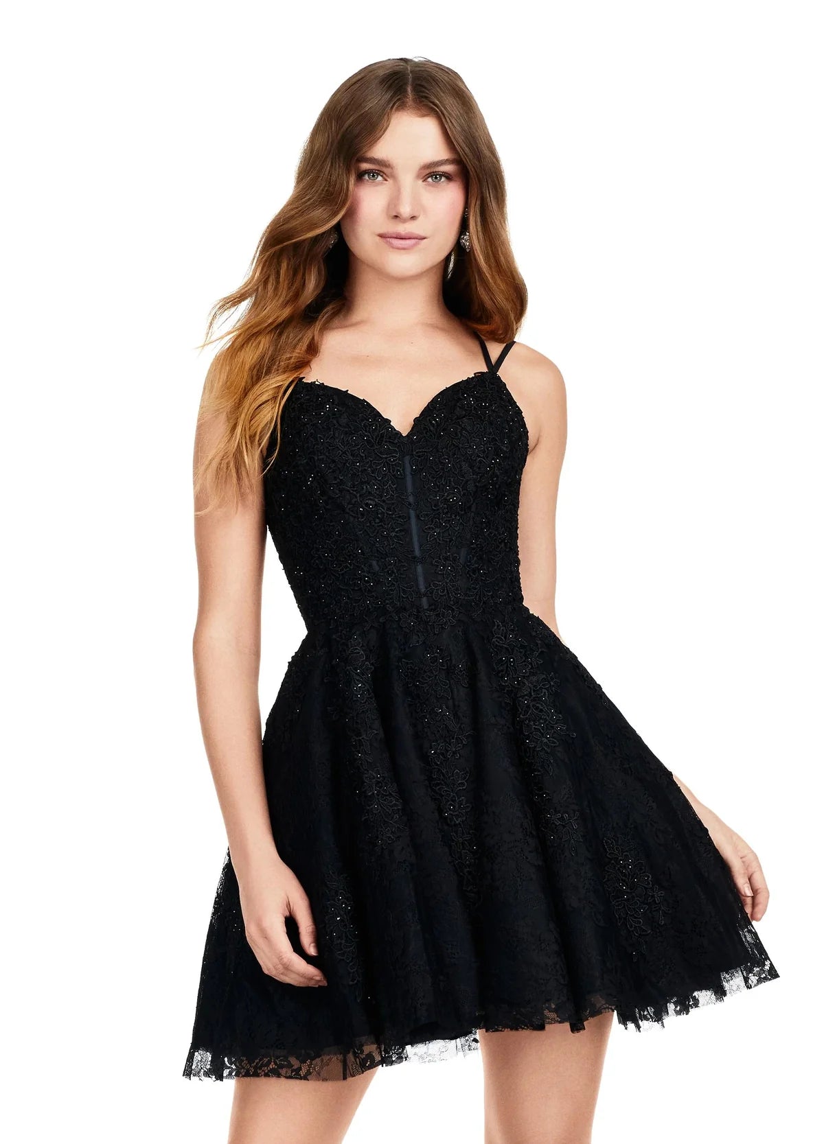 Black lace mini dress featuring a sweetheart neckline, fitted bodice, and flared skirt with delicate detailing.