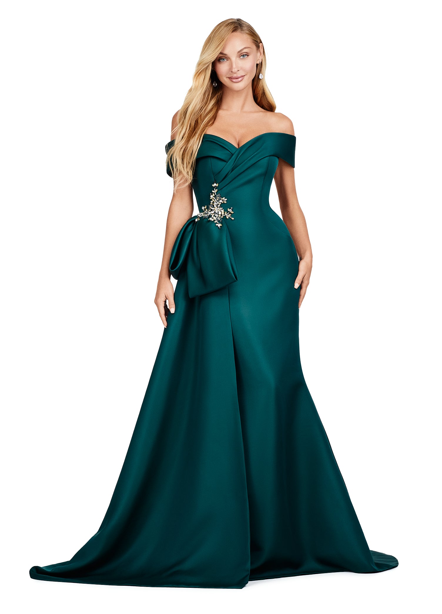 Emerald green evening gown featuring an off-the-shoulder neckline, elegant draped bodice, and statement side bow with intricate floral embellishment for added sophistication.