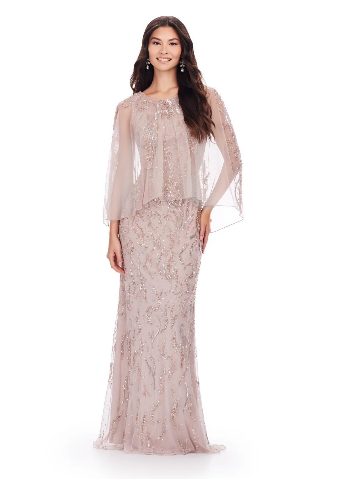 Elegant ivory evening gown with a beaded design, sheer cape-style overlay, and a floor-length silhouette for a refined and sophisticated look.