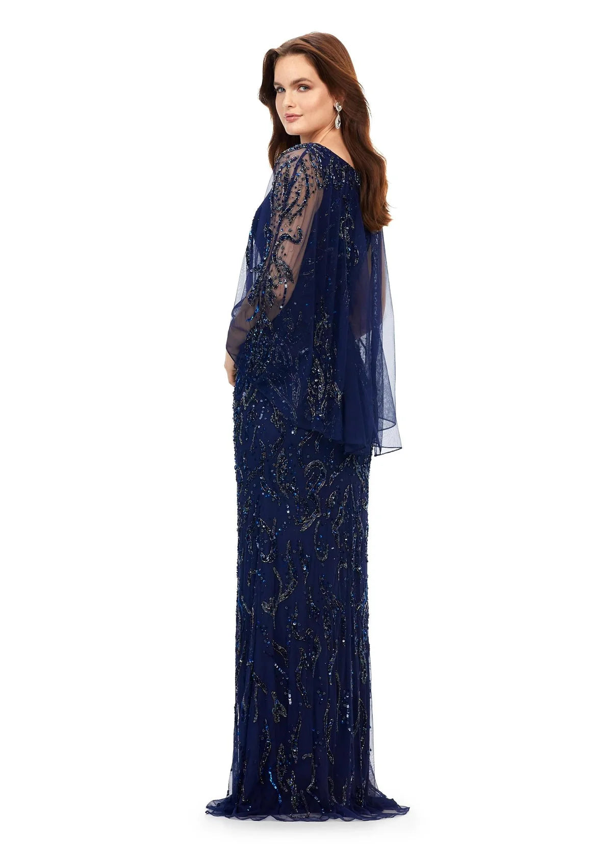 Side view - Elegant navy blue evening gown with a beaded design, sheer cape-style overlay, and a floor-length silhouette for a refined and sophisticated look.