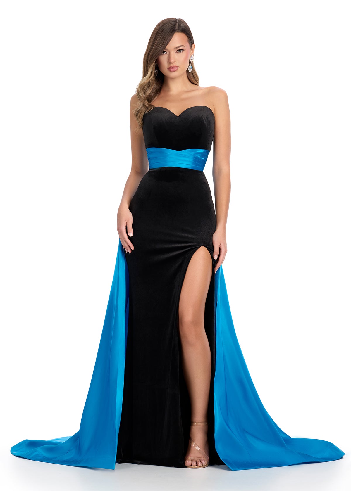 Strapless Evening Gown With Sweetheart Neckline, Side Slit, Contrasting Blue Sash And Train.







