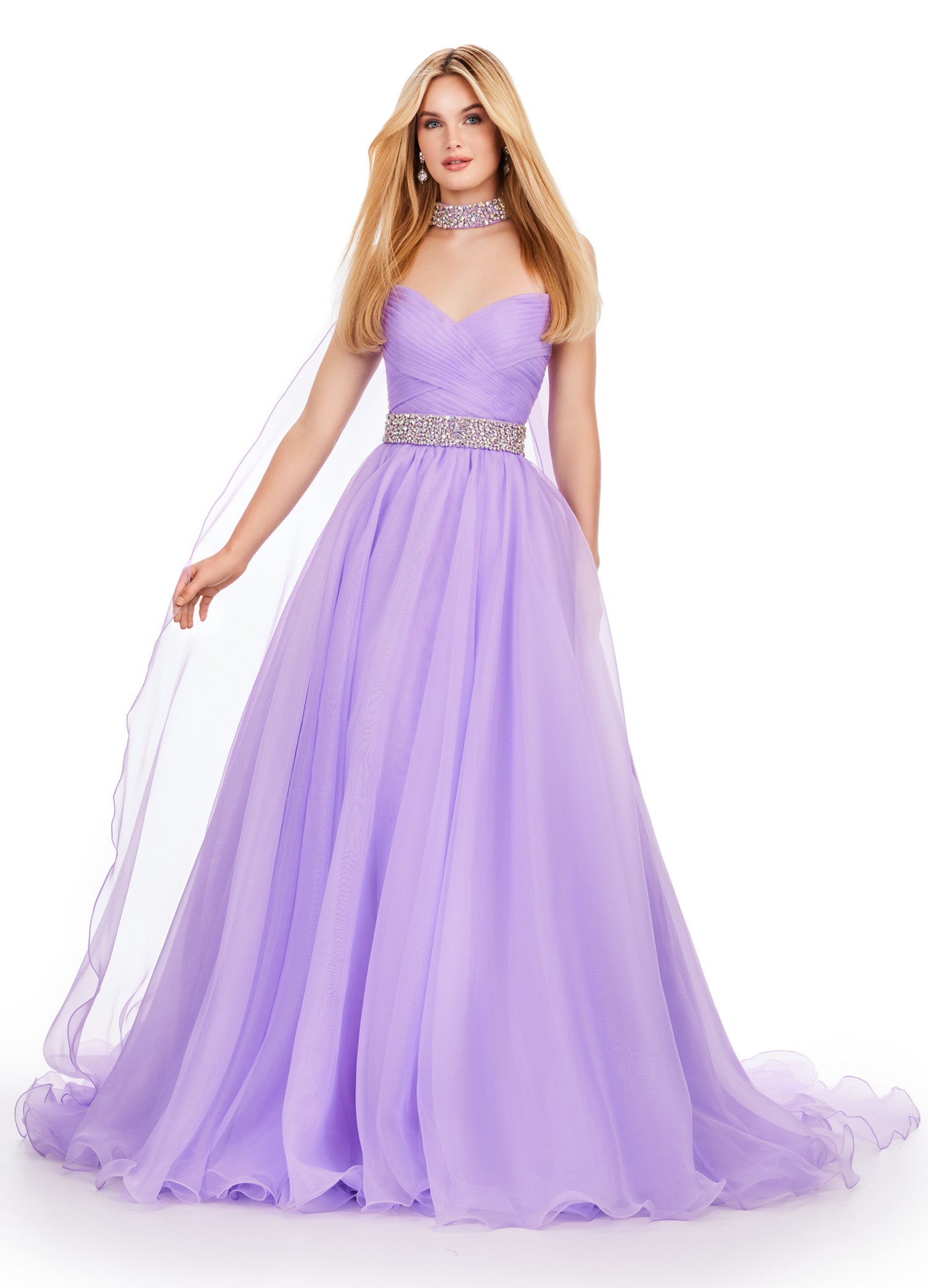 Lavender ball gown featuring a sweetheart neckline, ruched bodice, sparkling embellished waistband, and a flowing tulle skirt for a fairytale-inspired look.