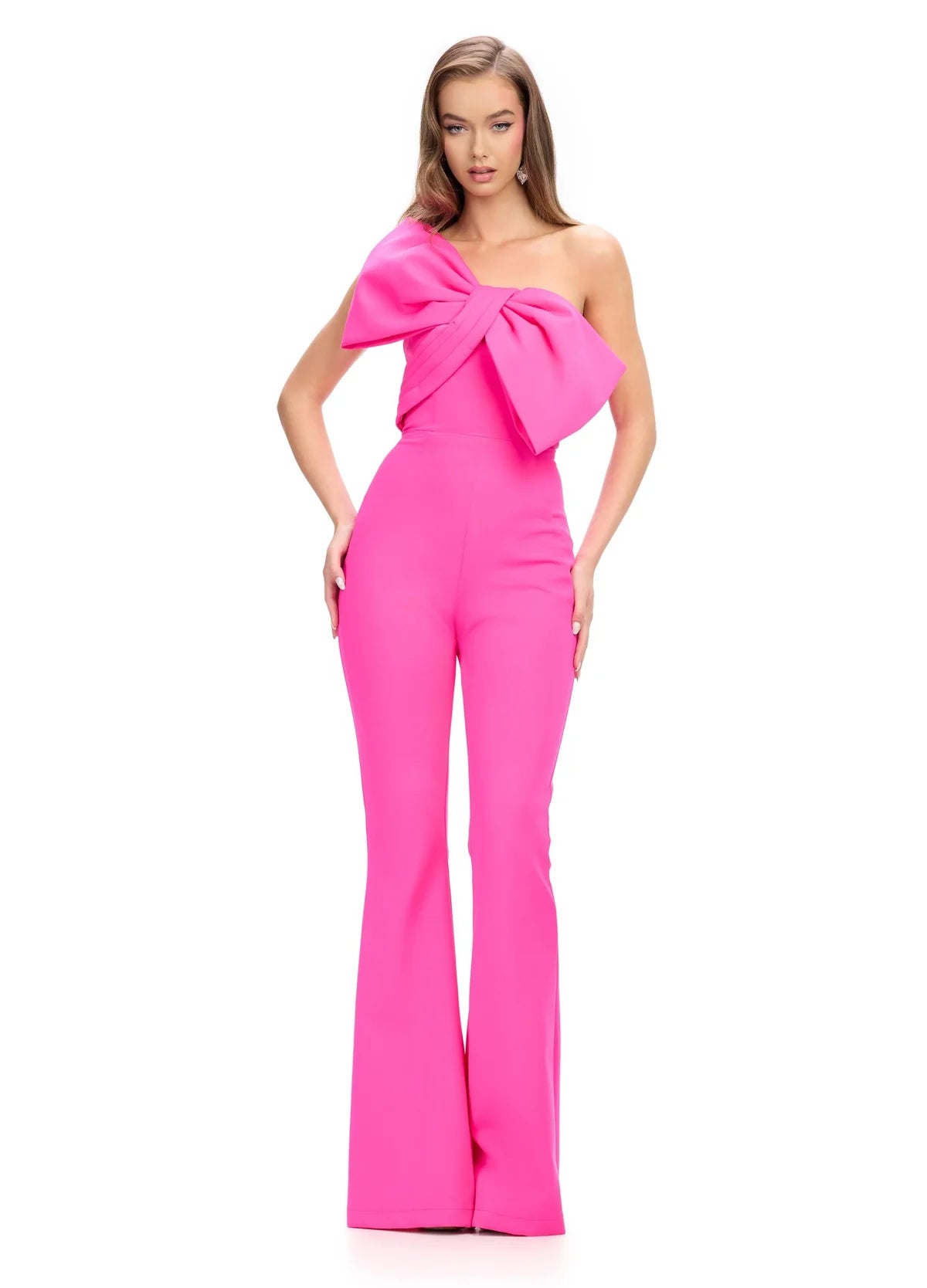 Hot Pink One-Shoulder Jumpsuit Featuring A Dramatic Oversized Bow Detail And Flared Trousers.