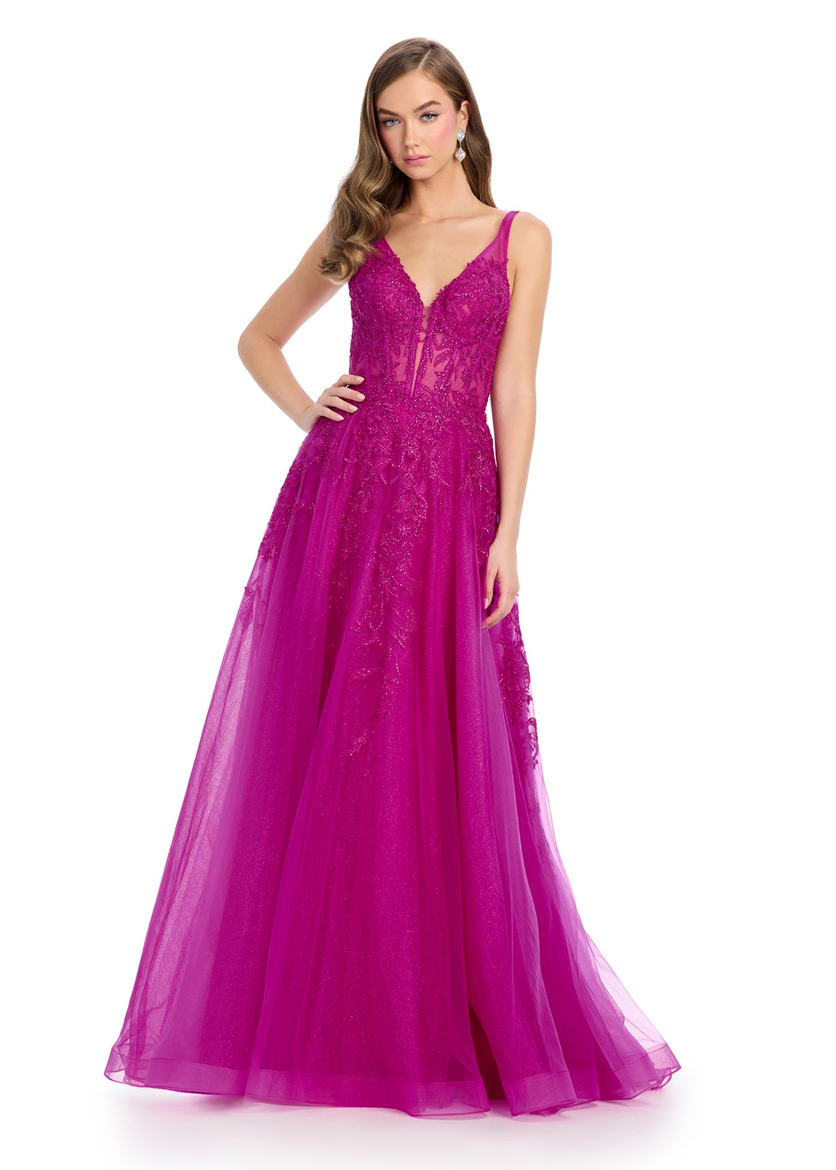 Video - Raspberry ball gown featuring intricate lace detailing on the bodice, a flattering V-neckline, and a flowing tulle skirt for a timeless and romantic look.