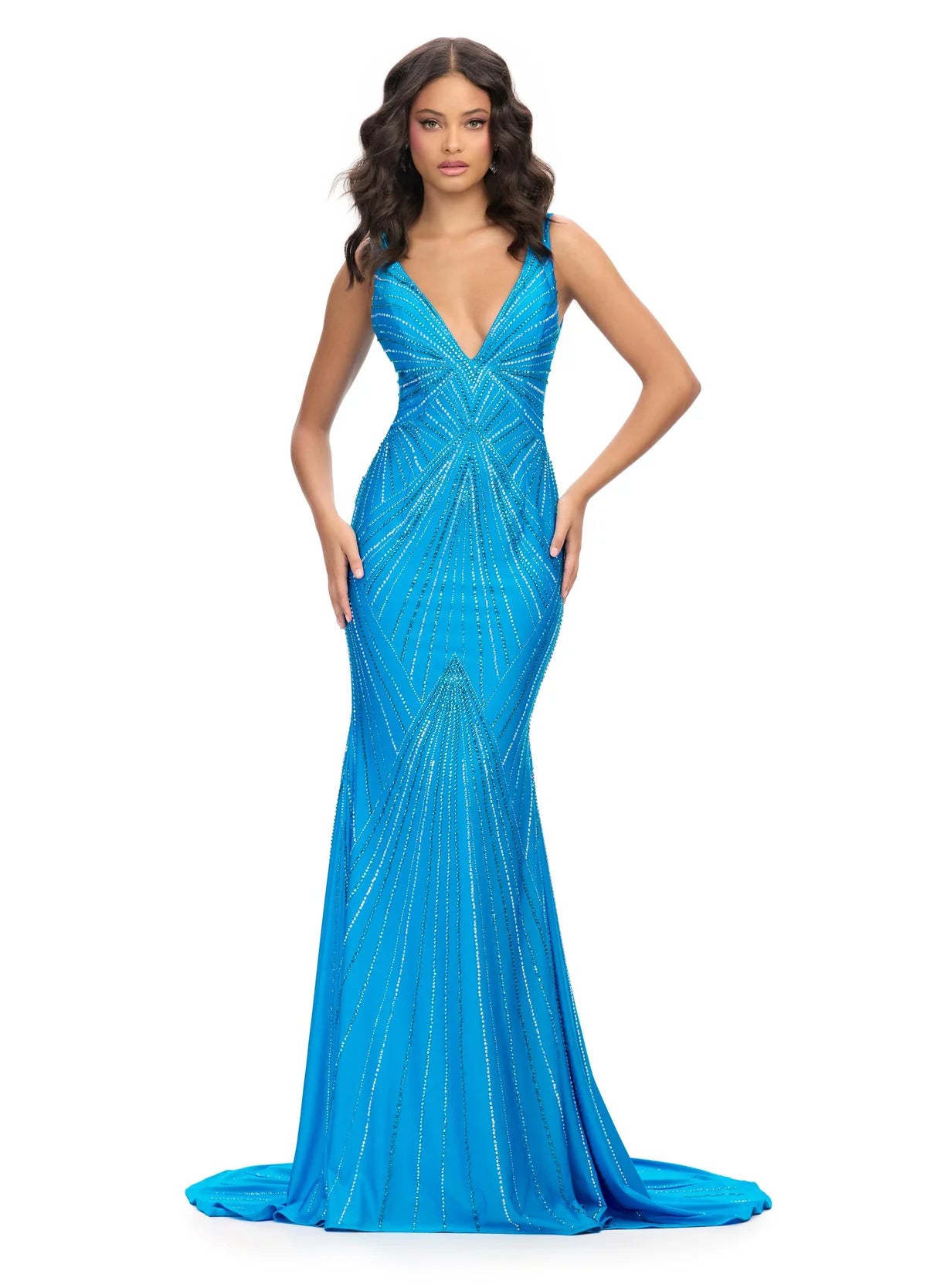 Close up video an elegant blue evening gown with a plunging V-neckline, adorned with shimmering geometric embellishments in silver and blue, creating a radiant, starburst effect for a strikingly glamorous look.