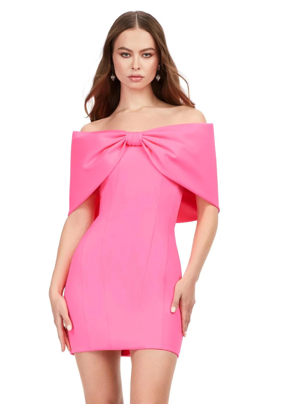 Video - Pink off-the-shoulder mini dress with a bold oversized bow detail, featuring a sleek fitted silhouette for a chic and modern statement look.