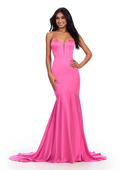 Close up video of a striking fuchsia satin mermaid gown featuring a plunging neckline, adjustable spaghetti straps with metallic detailing, and a flowing train, perfect for a glamorous evening or formal event.