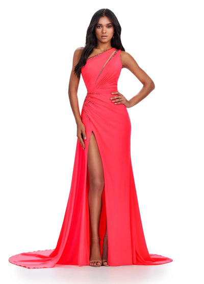 Video of a vibrant coral one-shoulder gown with elegant ruching, sparkling embellishments, and a dramatic high-slit skirt flowing into a sweeping train, designed for an unforgettable evening look.